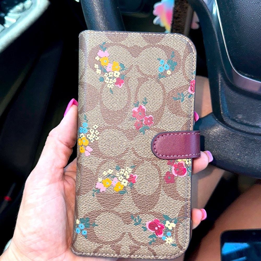 Coach phone case that also holds cards only three weeks old IPhone 14 pro max